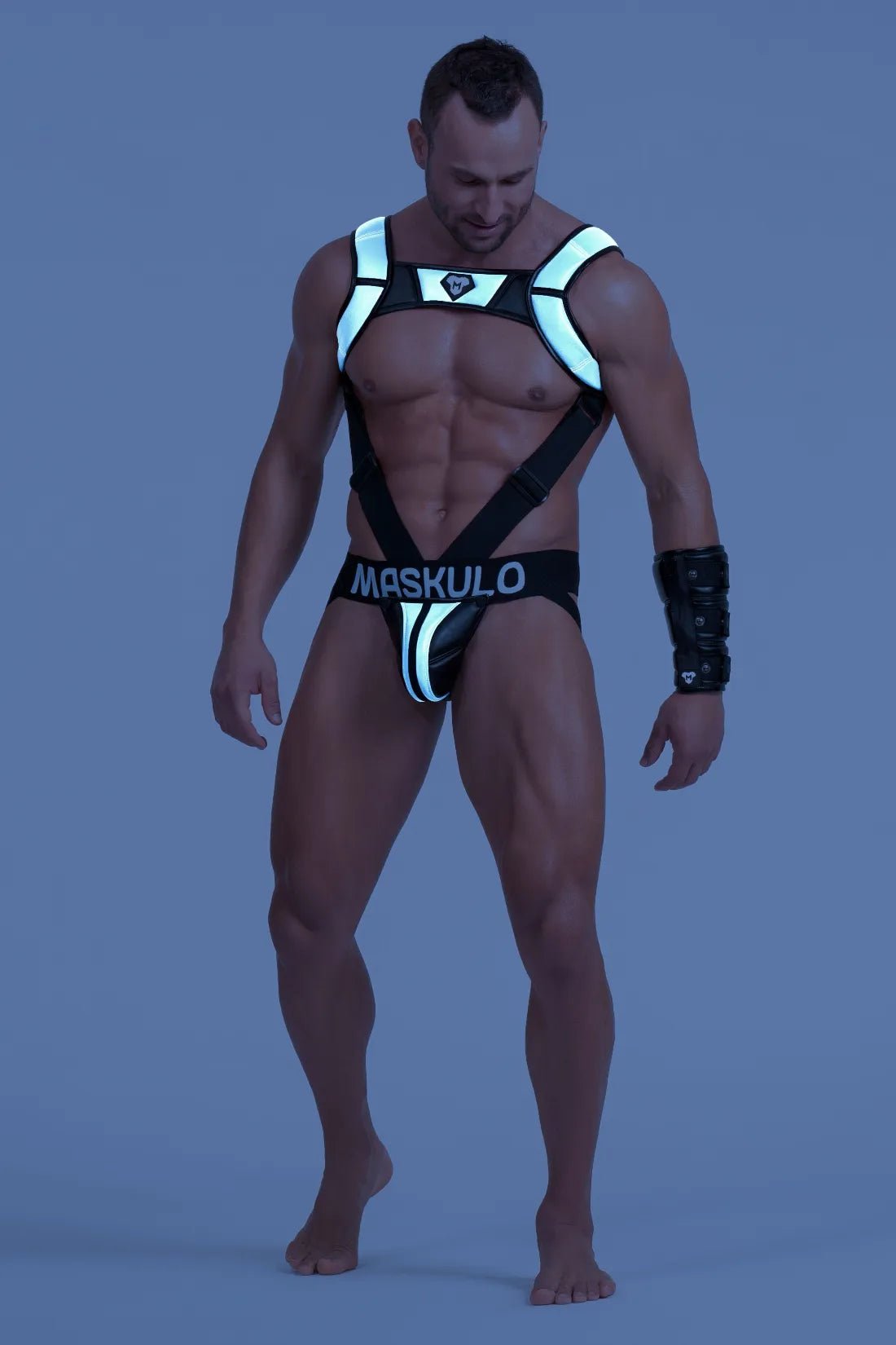 Black and grey "Big Bulge" jockstrap by Maskulo, featuring reflective light elements. Stylish and comfortable performance underwear for men.