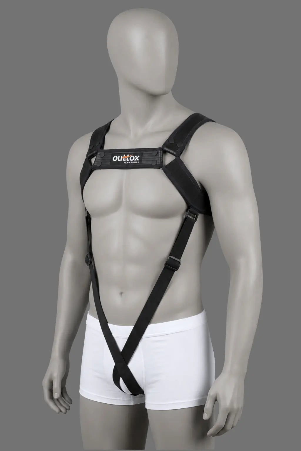Outtox par Maskulo. Harnais de corps avec boutons-pression. Noir