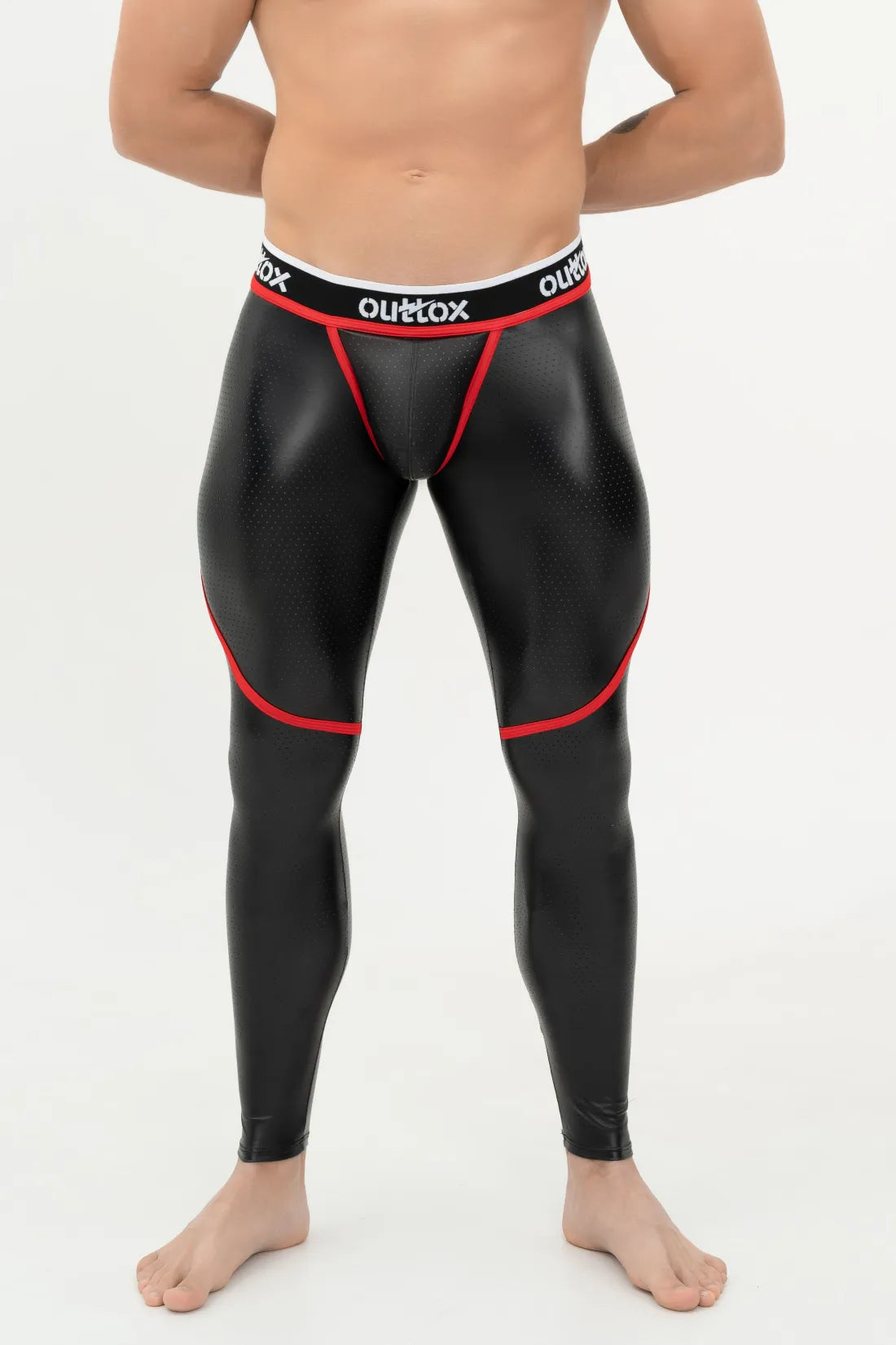 Outtox. Leggings mit Reißverschluss hinten und Druckknopf-Codpiece. Schwarz und Rot