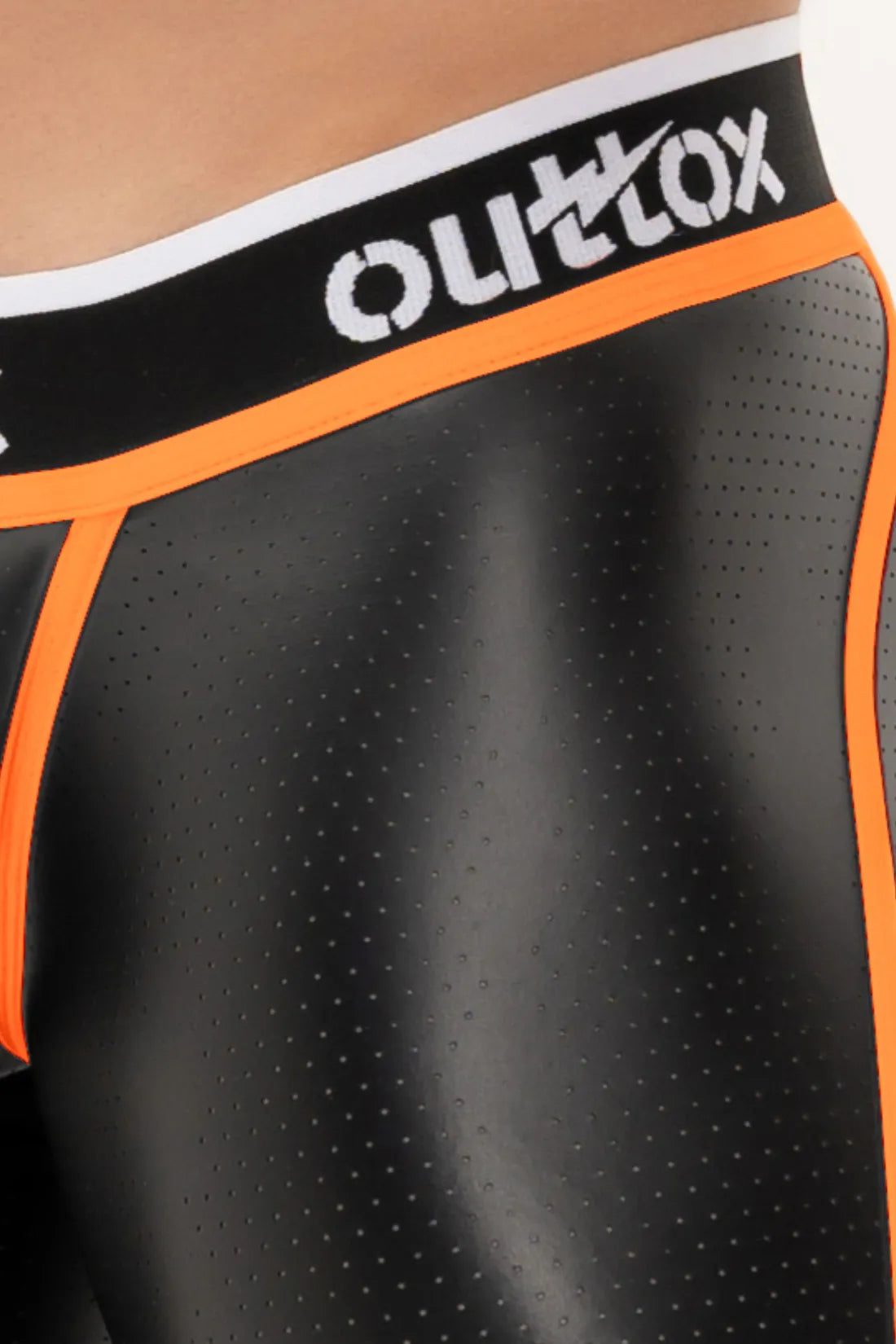 Outtox. Leggings mit Reißverschluss hinten und Druckknopf-Codpiece. Schwarz und Orange