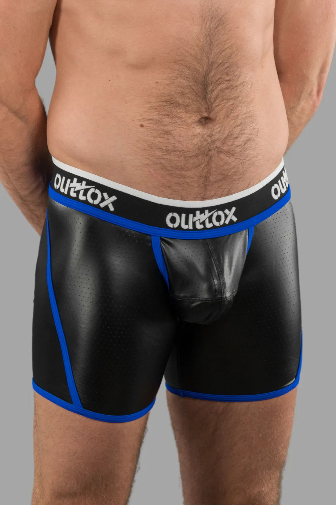 Outtox. Open achtershort met drukknoopsluiting. Blauw